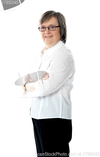 Image of Female employee posing with crossed arms