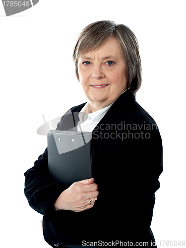 Image of Business woman holding important documents