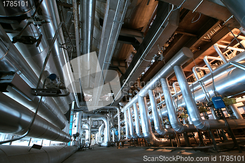 Image of Equipment, cables and piping as found inside of  industrial powe