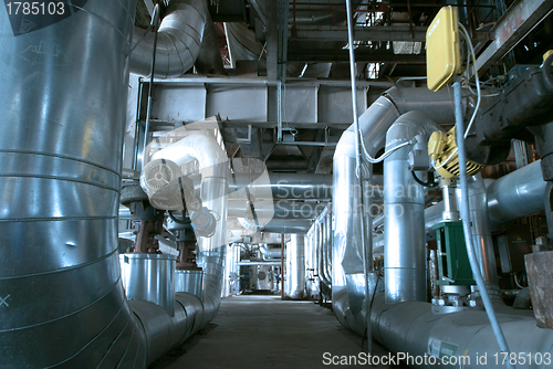 Image of Equipment, cables and piping as found inside of  industrial powe