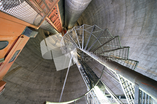 Image of Equipment, cables and stairs as found inside of  industrial powe