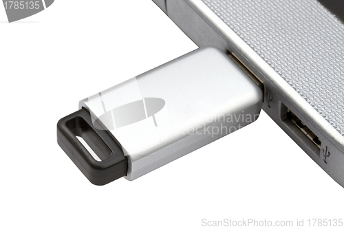 Image of USB Flash Drive and Laptop