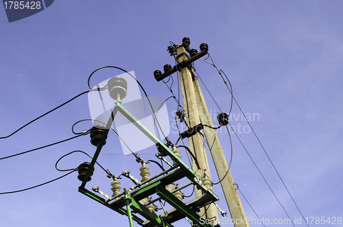 Image of Electricity poles and wires on blue sky background 