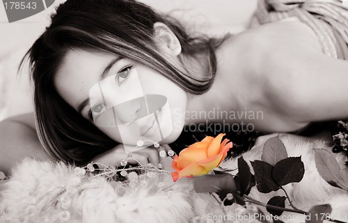 Image of Asian girl with a rose