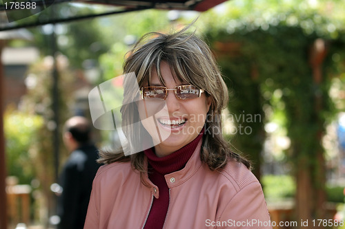 Image of Happy woman in the park