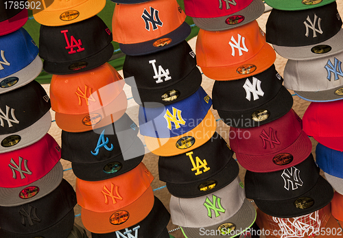 Image of Baseball caps on market stall