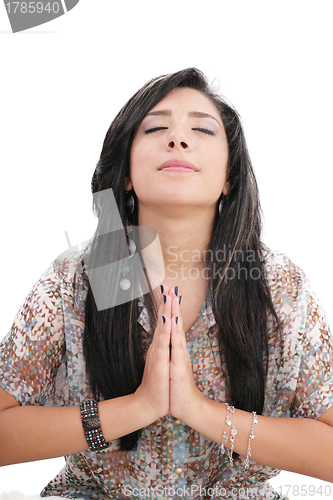 Image of Closeup portrait of a young caucasian woman praying 