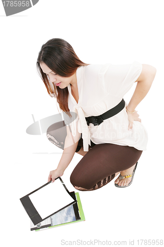 Image of Studio shot of pregnant model on white background