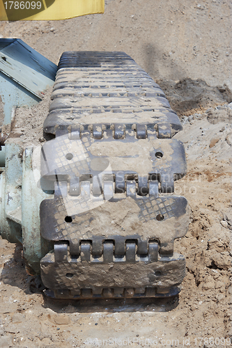 Image of Caterpillar excavator standing on ground