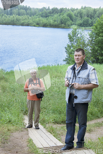 Image of The tourists on the lake