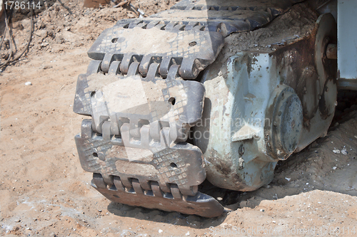 Image of Caterpillar excavator standing on ground