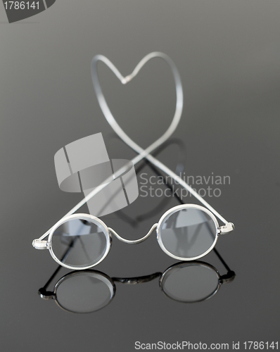 Image of Pair of old magnifying reading glasses 