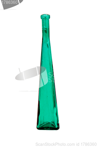 Image of Tall green glass vintage bottle isolated on white 