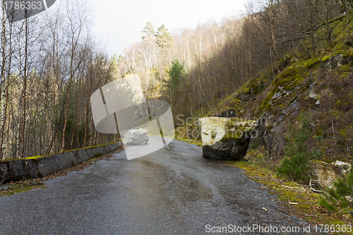 Image of run-down road in rural landscape