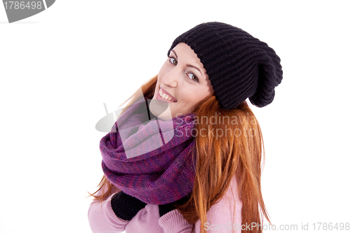 Image of young beautiful woman with hat gloves and scarf in winter isolated