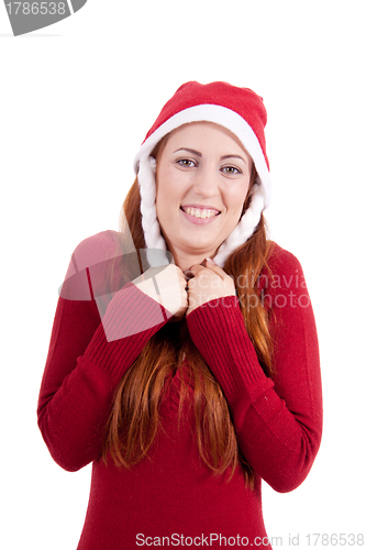 Image of smiling young woman at christmastime in red clothes isolated