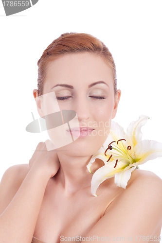 Image of beautiful natural woman face with flower isolated 