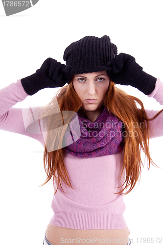 Image of young beautiful woman with hat gloves and scarf in winter isolated