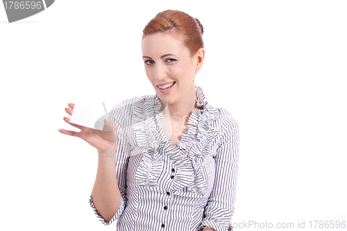 Image of beautiful young girl is holding a blank card in hand isolated