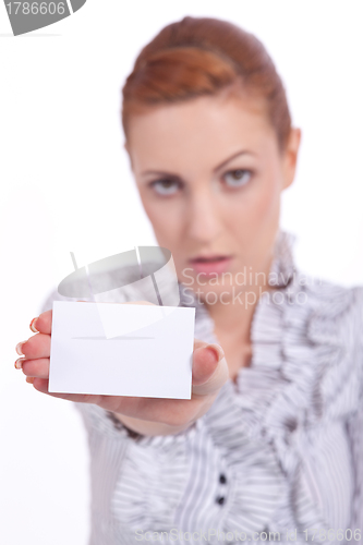 Image of beautiful young girl is holding a blank card in hand isolated