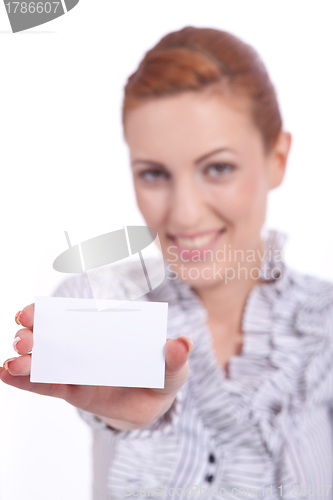 Image of beautiful young girl is holding a blank card in hand isolated