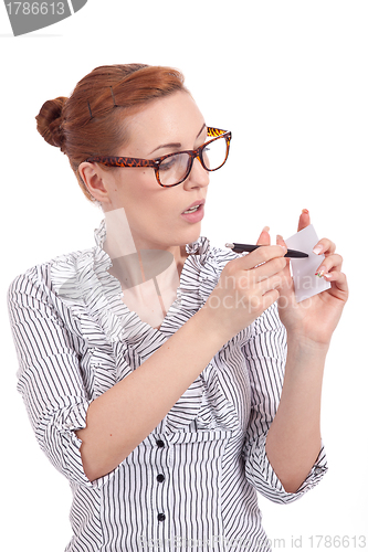 Image of beautiful young girl is holding a blank card in hand isolated