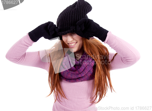 Image of young beautiful woman with hat gloves and scarf in winter isolated