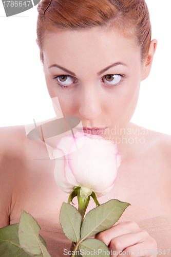 Image of beautiful young woman holding pink rose isolated