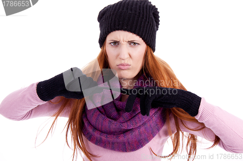 Image of young beautiful woman with hat gloves and scarf in winter isolated