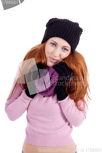 Image of young beautiful woman with hat gloves and scarf in winter isolated