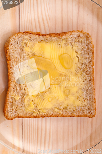 Image of bread butter and honey