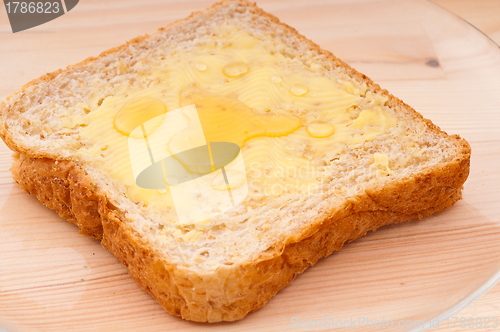 Image of bread butter and honey