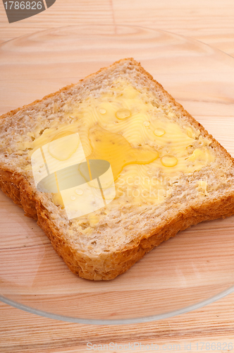 Image of bread butter and honey