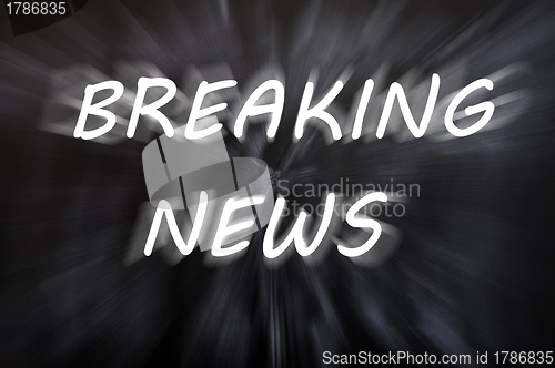 Image of Breaking news written with motion rays on retro blackboard background 