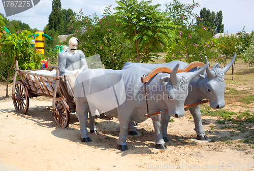 Image of Monument to Cossack in a cart with the bulls