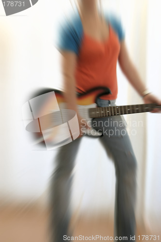 Image of female guitarist