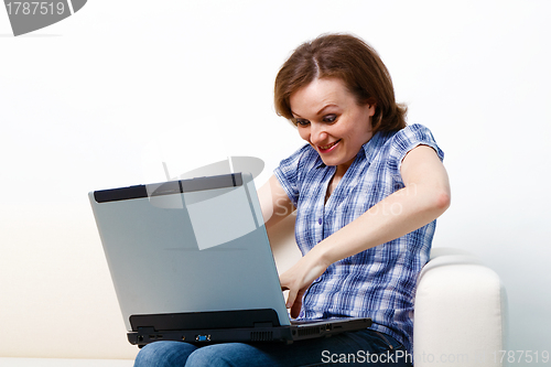 Image of funny girl with a laptop