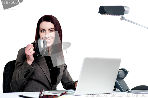 Image of Its time for a break. Woman enjoying coffee