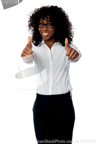 Image of Corporate woman gesturing double thumbs up