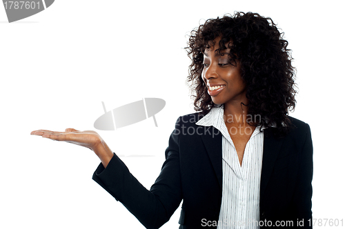 Image of African woman with open palm. Copy space