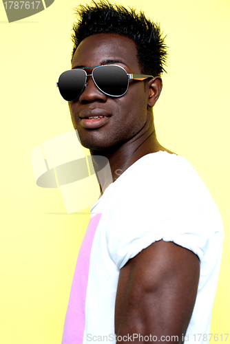 Image of Handsome african guy wearing goggles