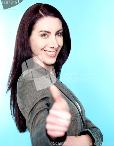 Image of Beautiful woman showing thumbs up