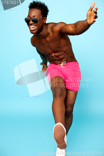 Image of Causal african male in boxers having great time