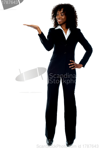 Image of Corporate african lady presenting copy space