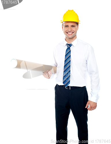 Image of Successful male builder holding blueprints