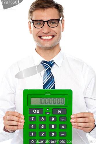 Image of Corporate man showing big green calculator