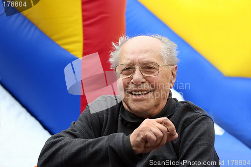 Image of Happy senior man on a colorful background