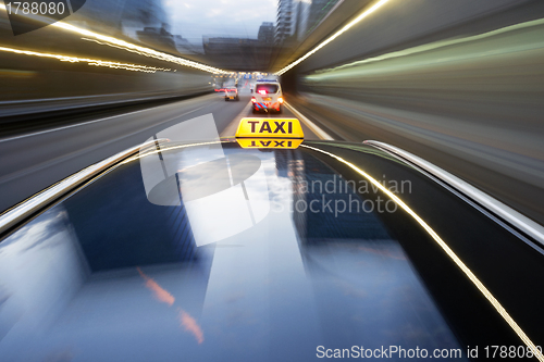 Image of Speeding taxi
