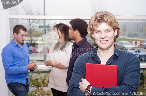 Image of Smiling young man on a college campus