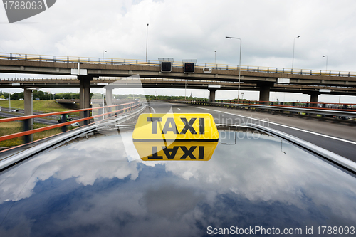 Image of Taxi on flyover